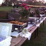 We used old shutters as a runner for the farm tables. The menu for this wedding included southern fried chicken, old fashion pot roast with gray, buttermilk mash potatoes, southern style green beans, and homemade southern chive biscuits with peach sauce..