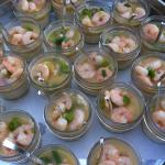 Shrimp and grits served in mini jelly jars for cocktail hour
